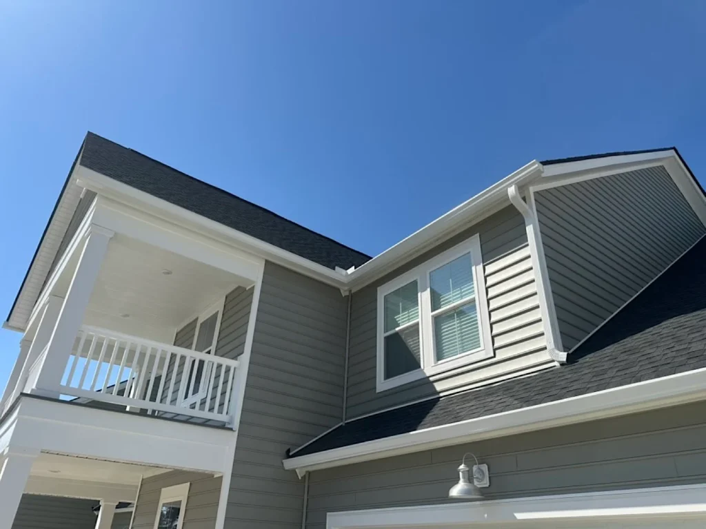 White 6 inch gutter installed over a garage in Moncks Corner, SC.