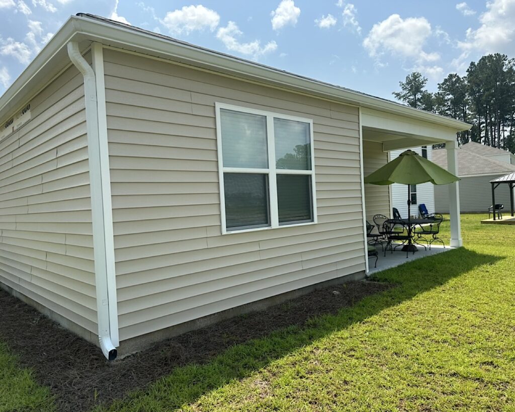 A close-up of a well-maintained gutter system preventing water damage.