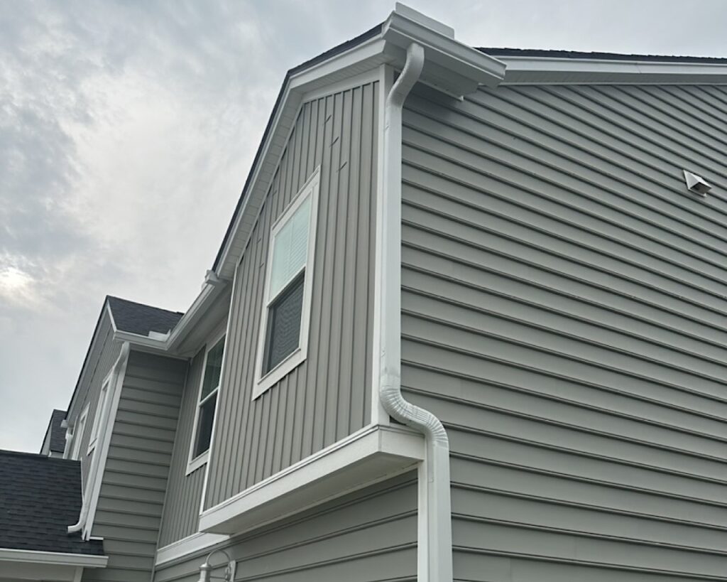 Gutters and downspouts installed on 2 story home in Summers Corner community in Summerville, SC